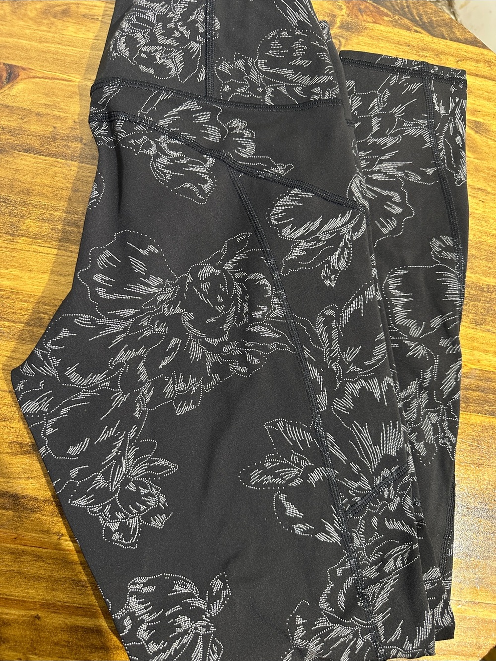 Athleta Black Leggings with Light Gray Floral Sketch Print